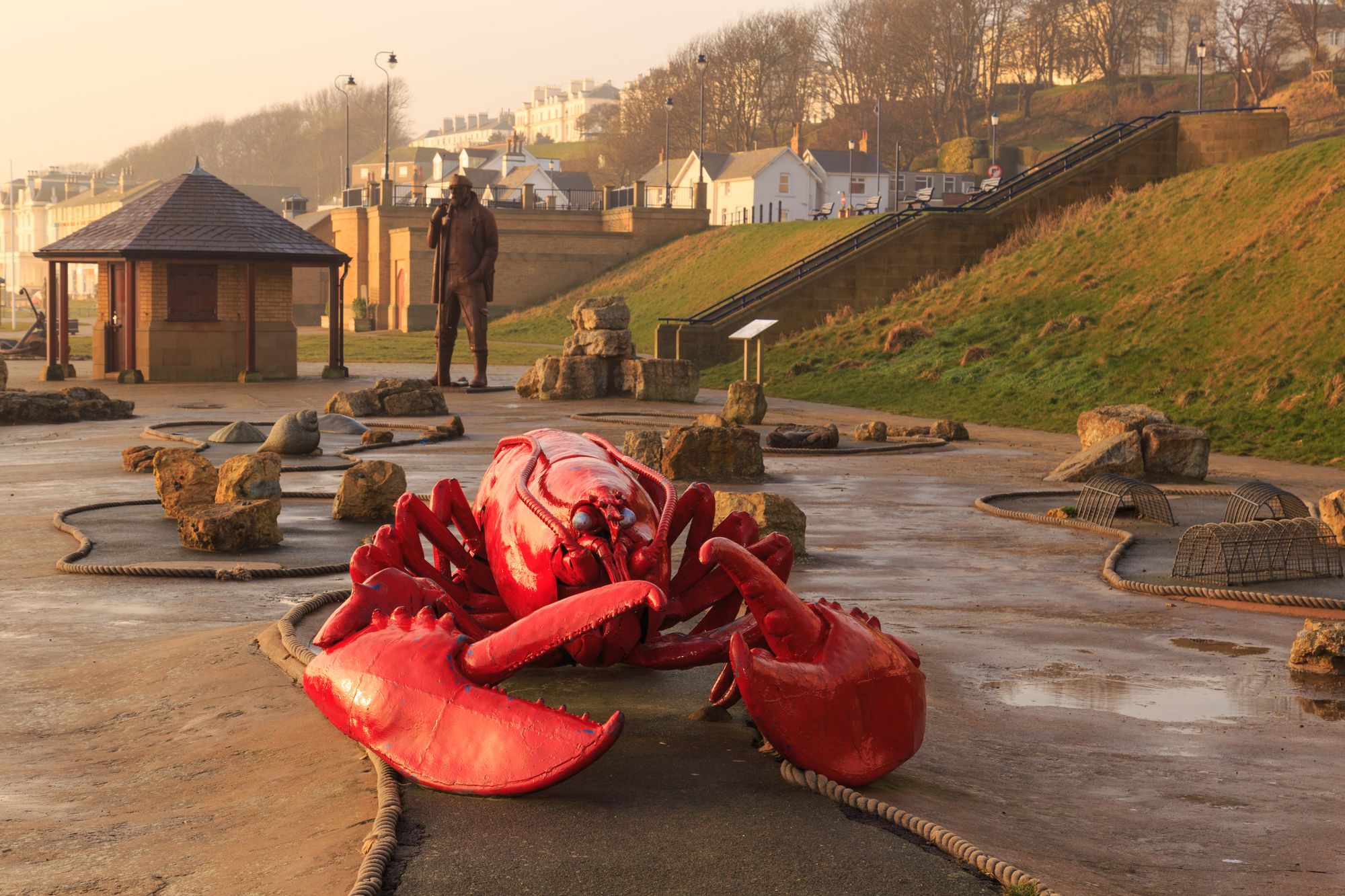 Large lobster sculpture on the mini golf course on the coast of Filey beach