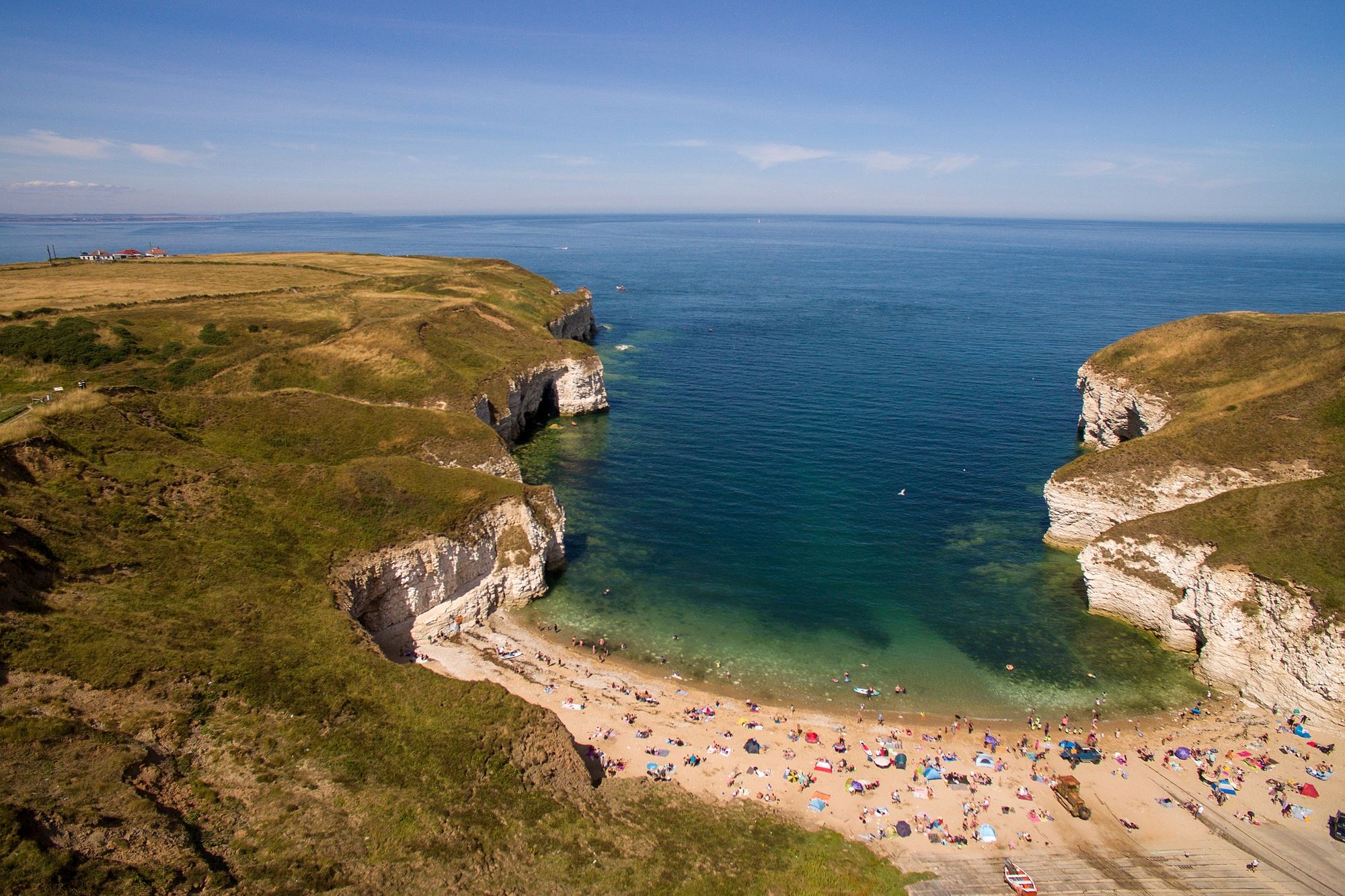 Aerial shot of Flamborough Head and the beach in the bay